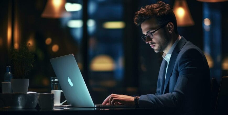 ai-generated-businessman-working-on-laptop-at-night-in-office-business-concept-concentration-entrepreneur-using-pc-technology-in-the-office-ai-generated-free-photo